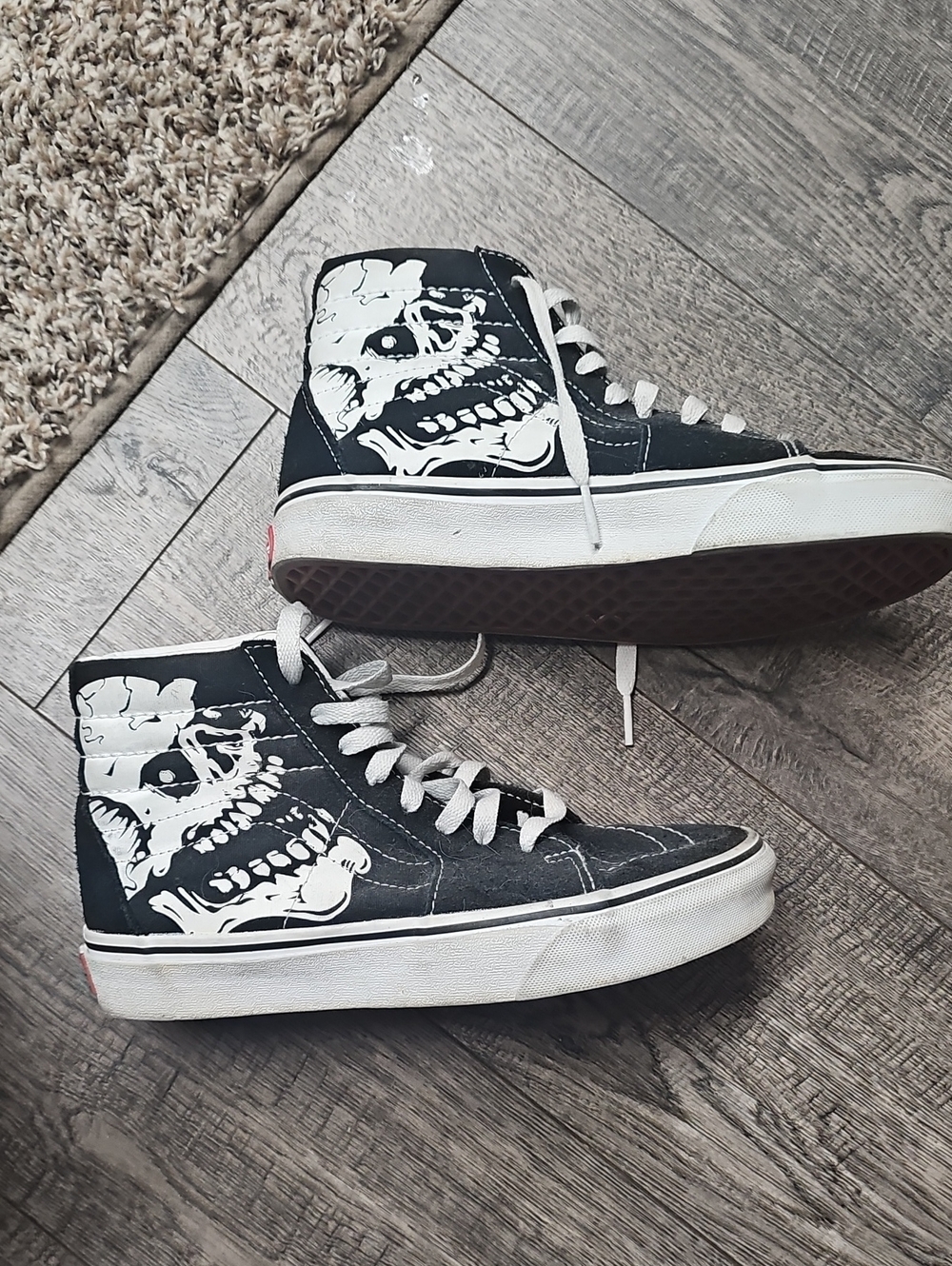 Vans Black High-Top Sneakers with White Skull Graphic